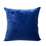 Housse de coussin Africa losange arrondi bleu marine, bleu ciel, vert et rouge