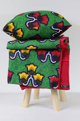 Housse de coussin Africa lanterne rouge et jaune sur fond vert