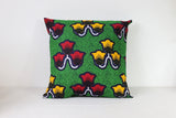 Housse de coussin Africa lanterne rouge et jaune sur fond vert
