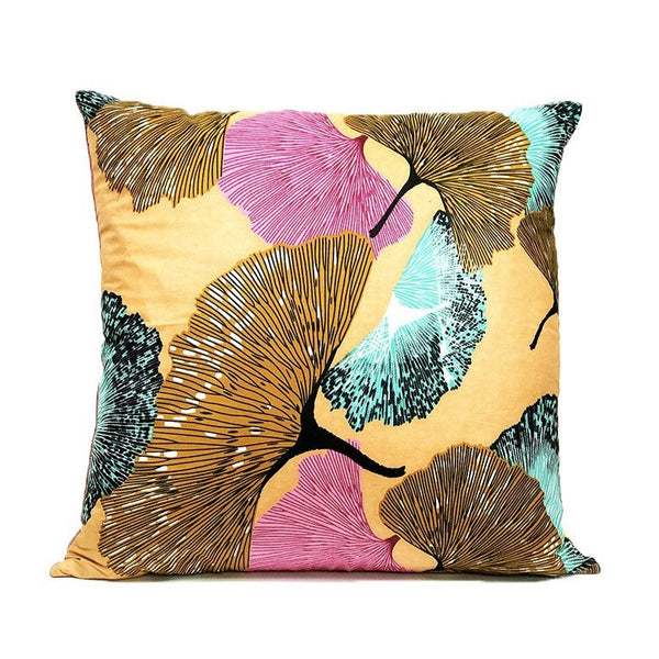 Housse de coussin feuilles géantes rose, vert pistache, marron sablé, sur fond saumon